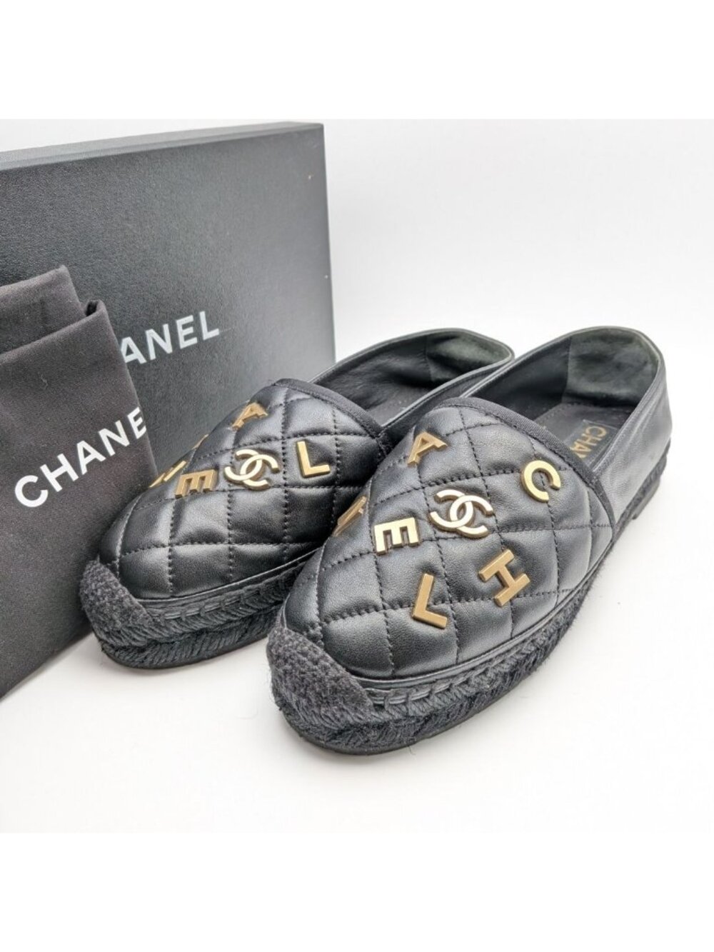 Chanel CC Logo Quilted Lambskin Black Gold Slip-on Sneakers